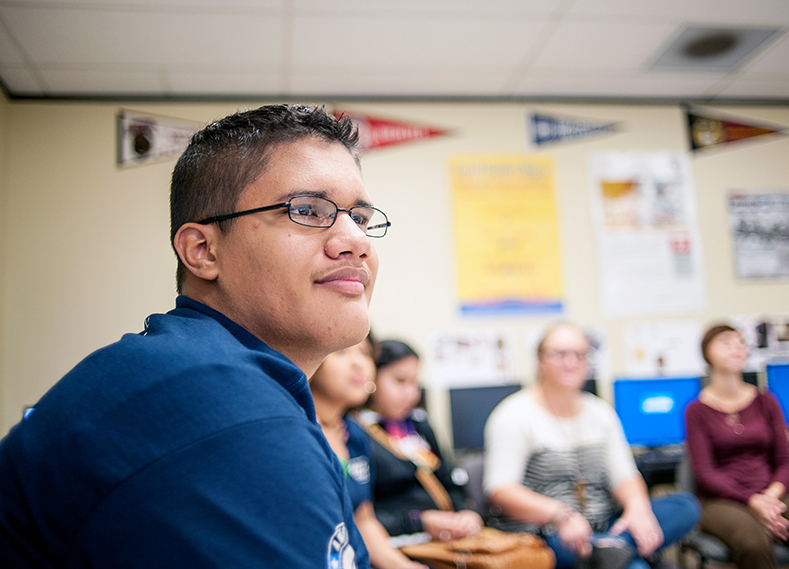 Close up of a YouthBuild Austin participant in a classroom.