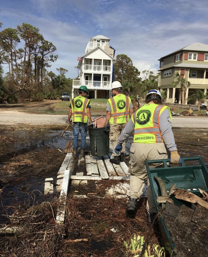 Disaster response crew clearing debris after Hurricane Michael