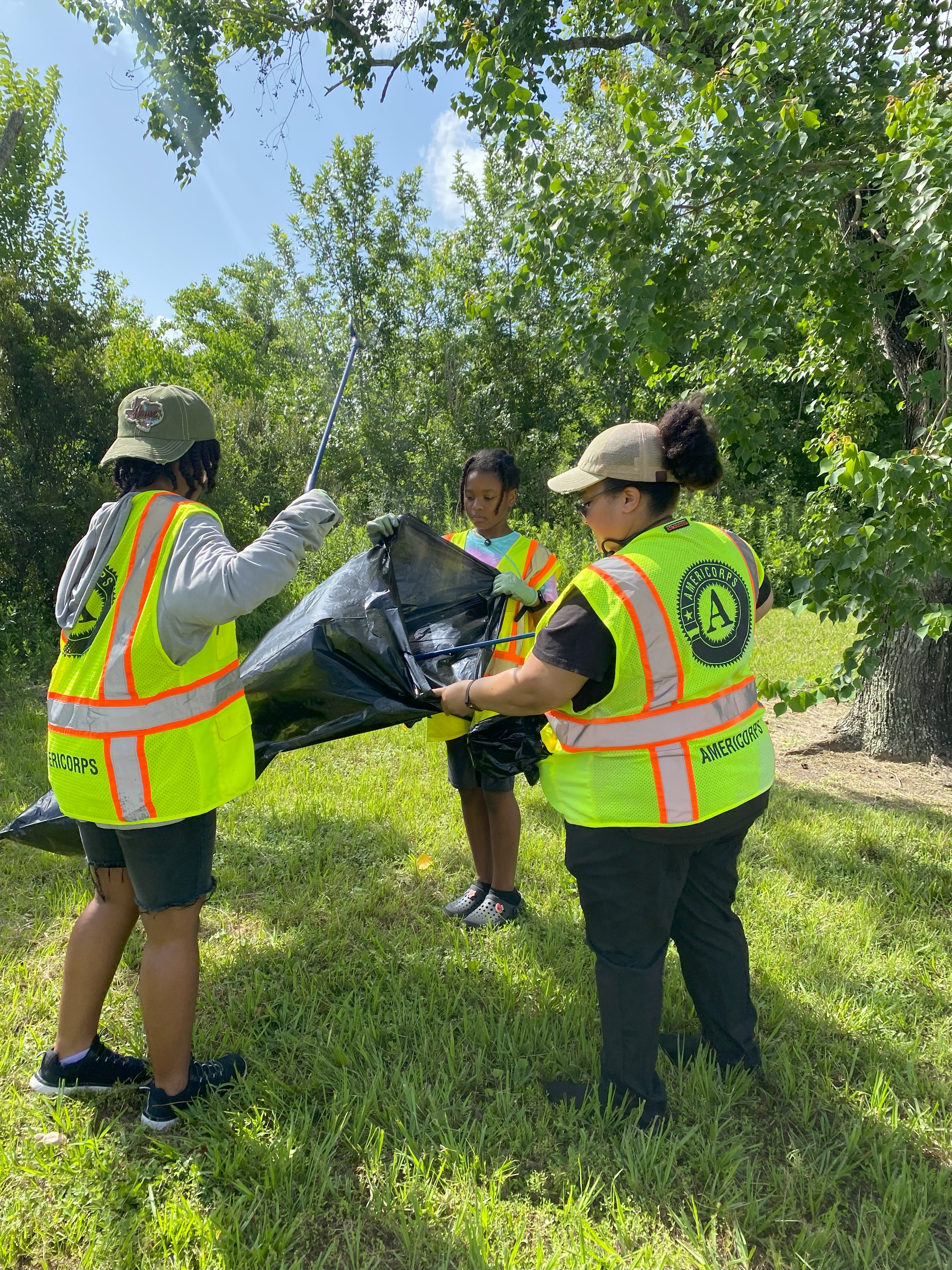 TXCC participants picking up trash.