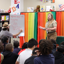 IPs giving a presentation to a class.