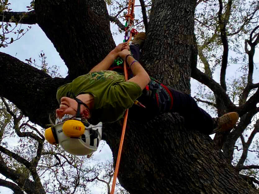 TXCC program participant at a tree climbing workshop
