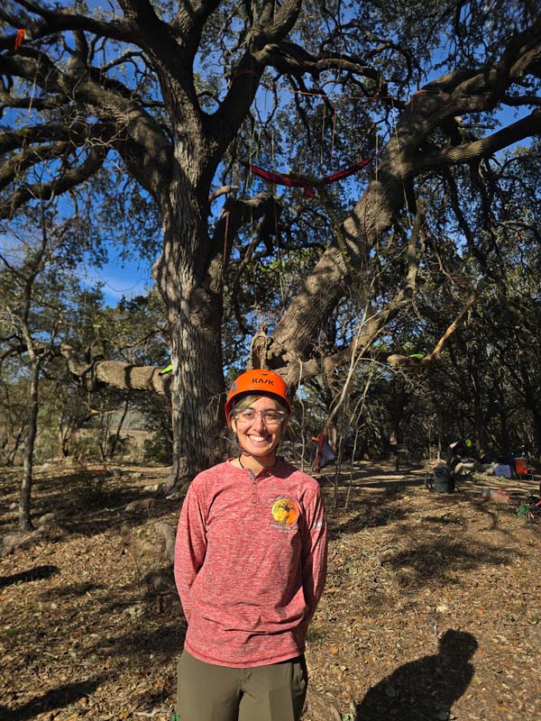Mahnoor in front of the tree used in the workshop