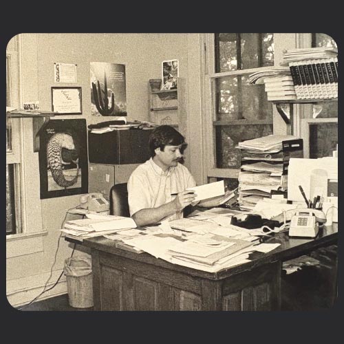 AYW founder, Richard Halpin, at his office desk.